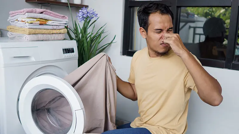 mi lavadora deja la ropa con olor a humedad - Por qué huele mal la ropa después de lavarla